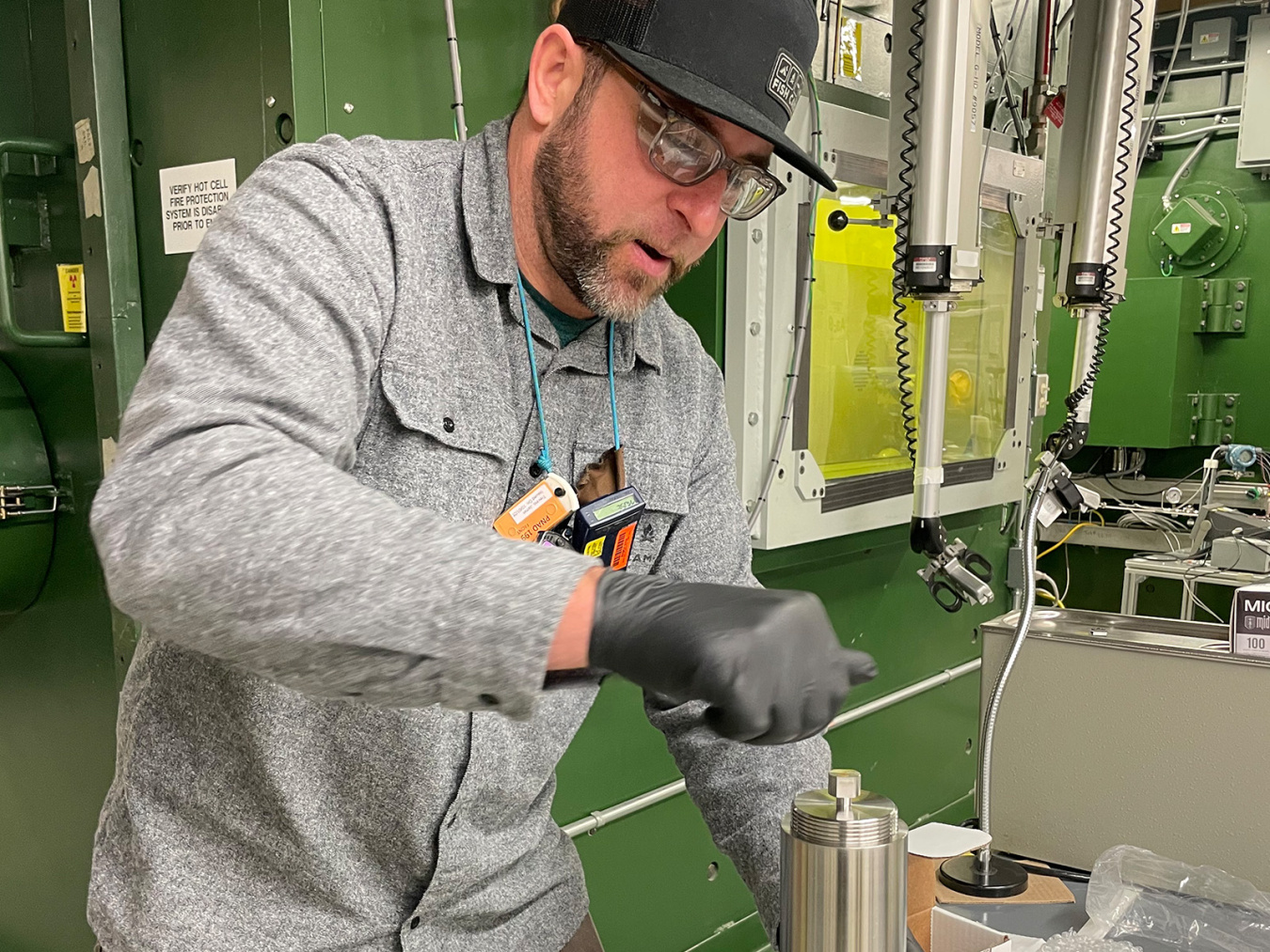 PNNL’s Jamin Trevino practicing the choreographed steps for handling the special form capsule that holds the radium-226. Image courtesy of Jamin Trevino | Pacific Northwest National Laboratory
