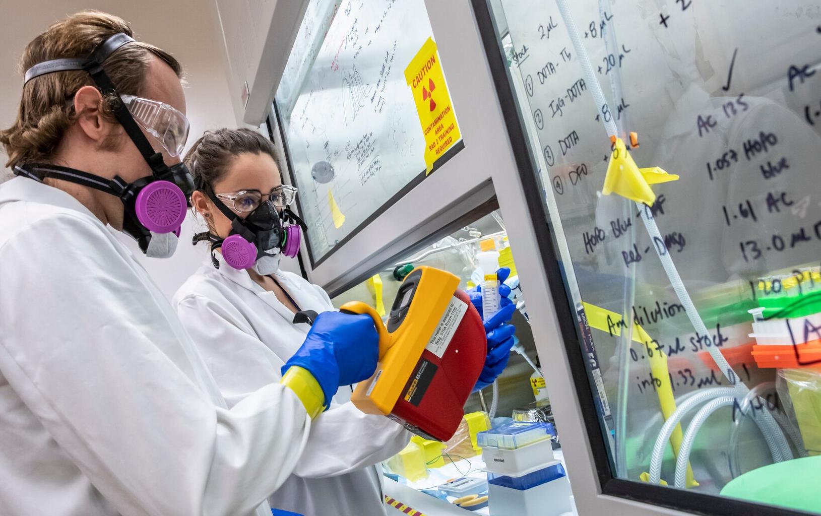 Scientists, like Korey Carter, left, and Katherine Shield, had to overcome what one of their collagues called “a long series of unfortunate events” to work out einsteinium’s chemical properties.Credit...Marilyn Sargent/Lawrence Berkeley National Laboratory, University of California