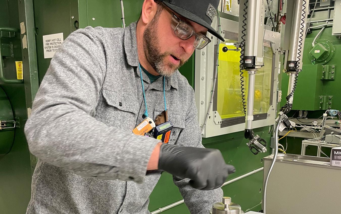 PNNL’s Jamin Trevino practicing the choreographed steps for handling the special form capsule that holds the radium-226. Image courtesy of Jamin Trevino | Pacific Northwest National Laboratory
