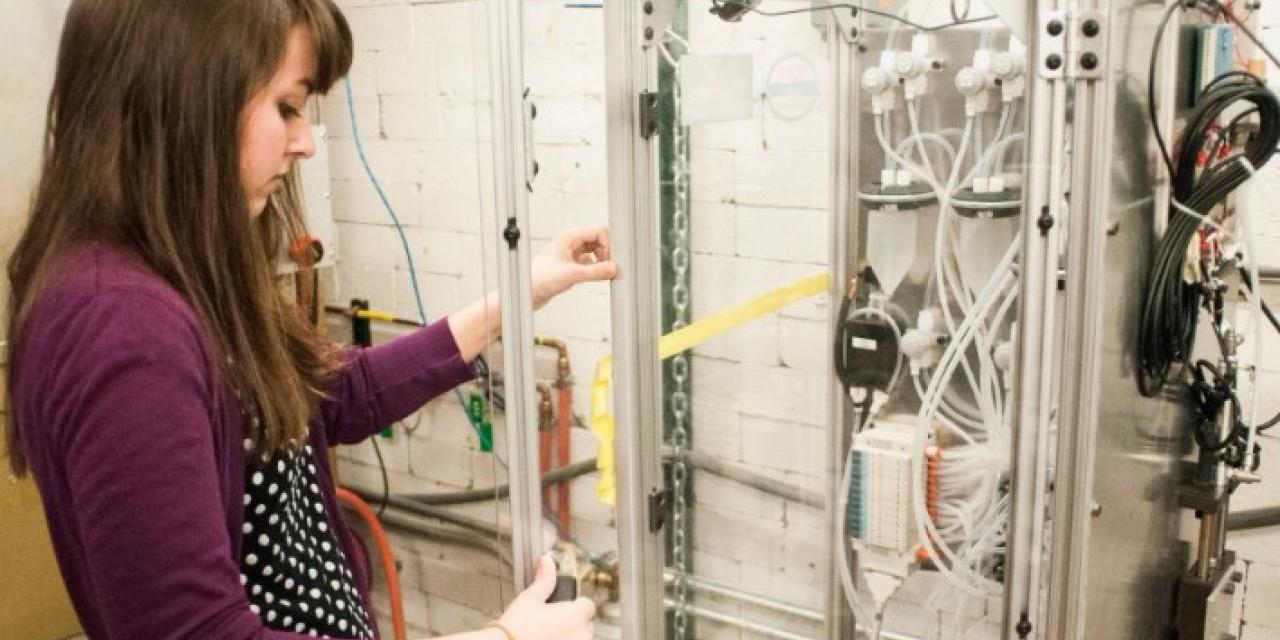 Graduate student Paige Abel performing research on isotope harvesting techniques to be used at the FRIB Isotope Harvesting Facility. Photo by: Facility for Rare Isotope Beams, Michigan State University